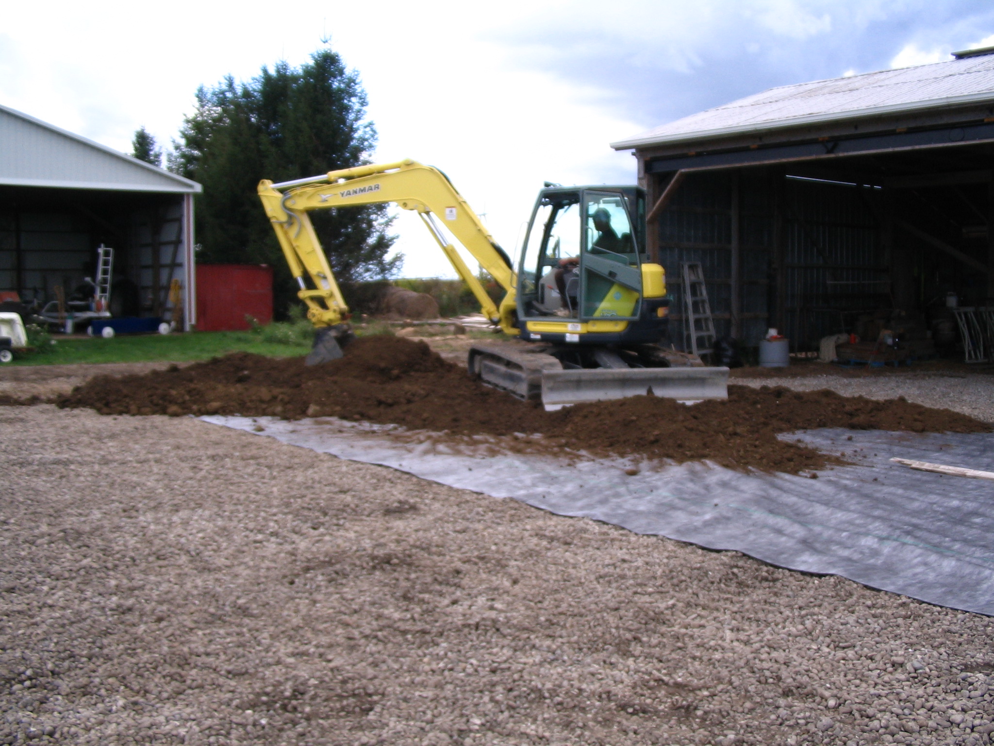 Next we installed filter cloth and then leveled with 8” of clay top soil
